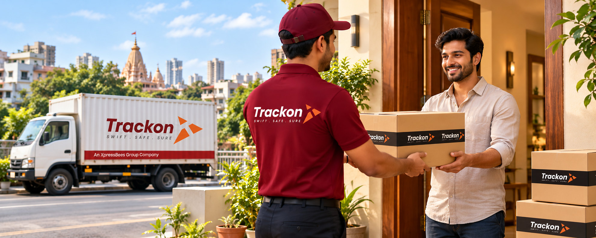 Trackon courier handing a parcel to a customer at his doorstep