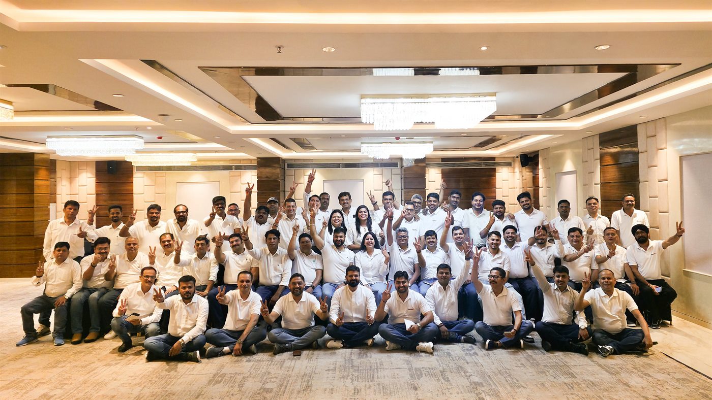 Trackon team celebrating together at a company meet